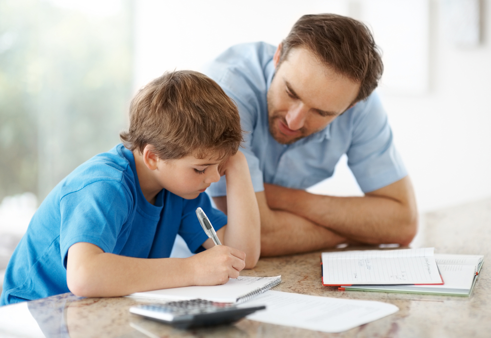 dad helping son 